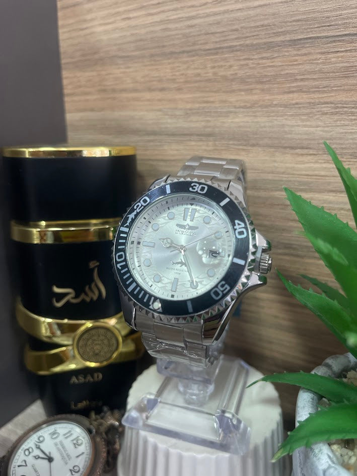 RELOJ INVICTA PLATEADO ARO NEGRO