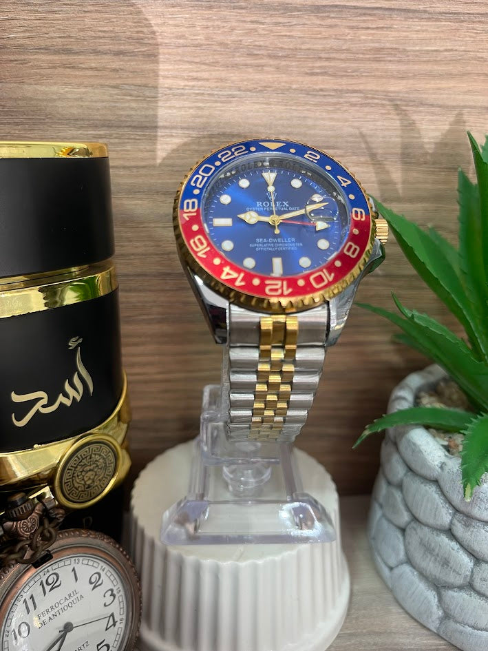 RELOJ ROLEX CABALLERO BICOLOR DETALLES ROJOS Y AZUL