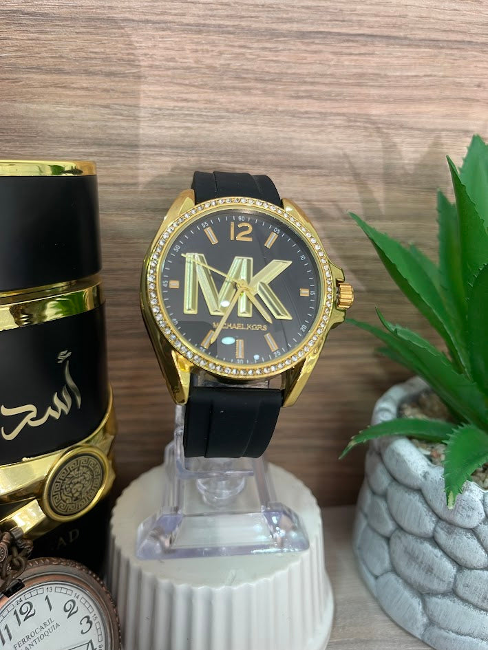 RELOJ MK DORADO MANILLA N SILICONA