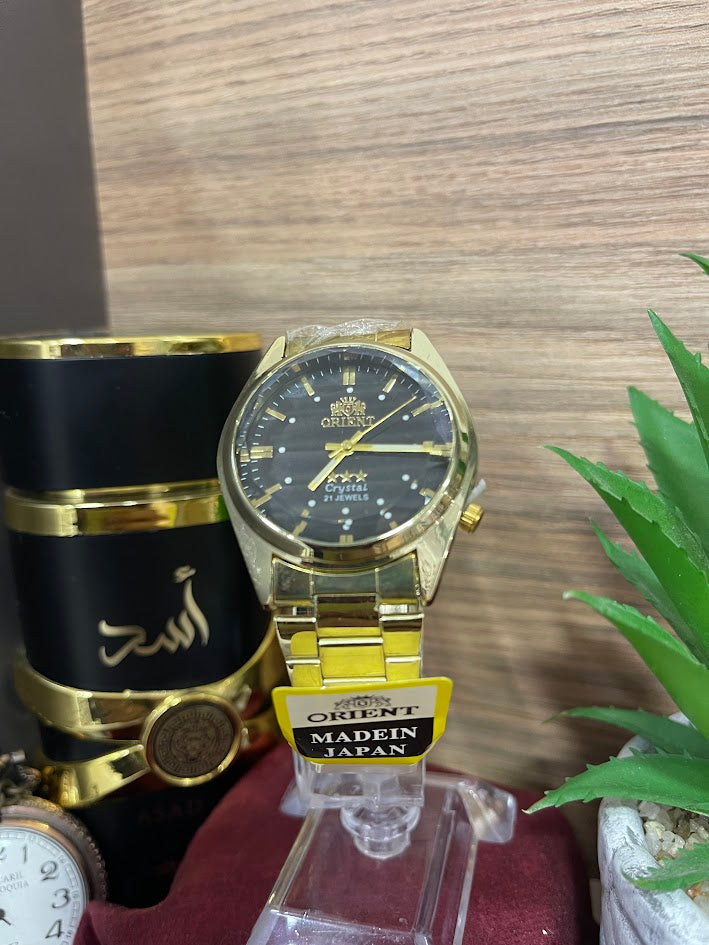 RELOJ ORIENT DORADO ESFERA NEGRA