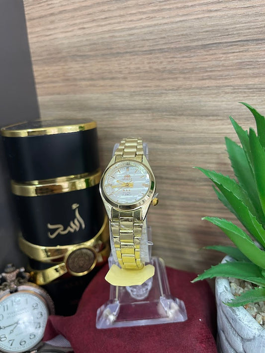 RELOJ ORIENT DORADO FONDO PLATEADO