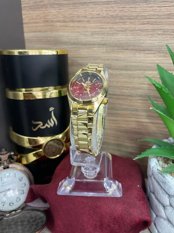 RELOJ ORIENT DORADO Y ROJO