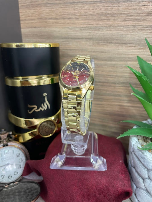 RELOJ ORIENT DORADO Y ROJO