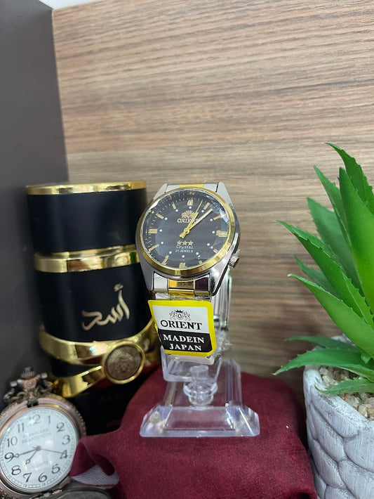 RELOJ ORIENT BICOLOR Y NEGRO