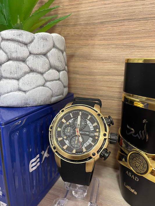 RELOJ EXTRI NEGRO Y DORADO