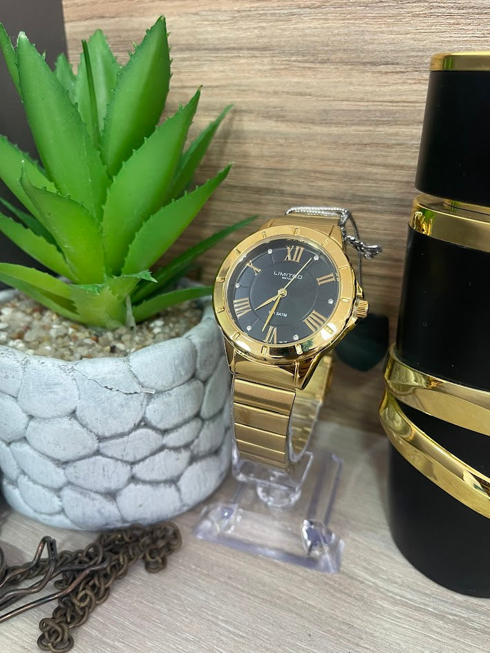 RELOJ LIMITED DORADO FONDO NEGRO