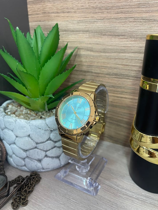 RELOJ LIMITED DORADO ESFERA AGUA MARINA