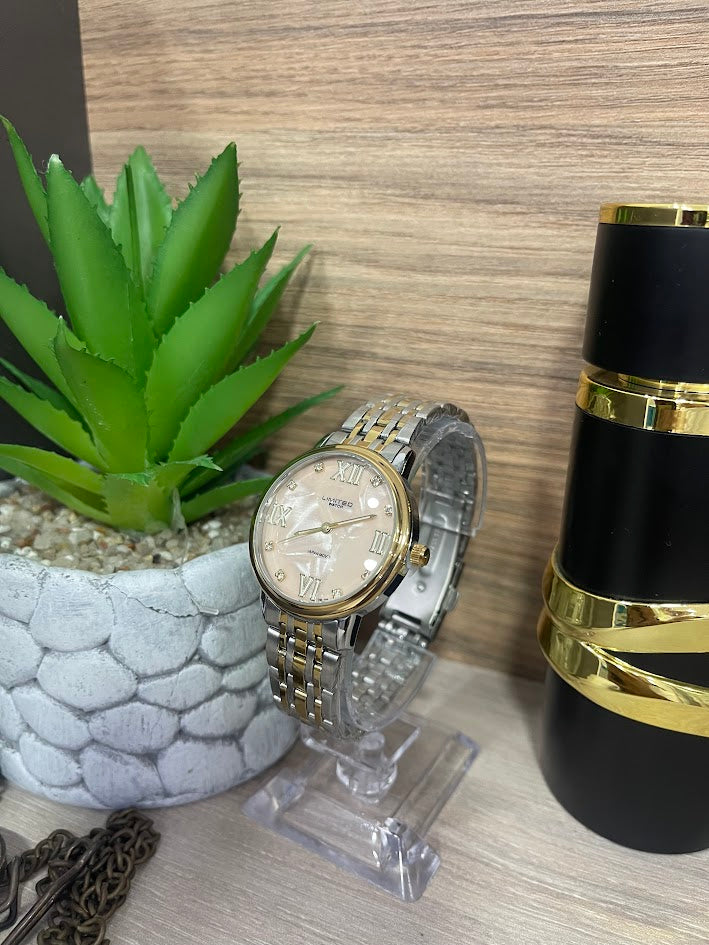 RELOJ LIMITED BICOLOR FONDO ROSADO