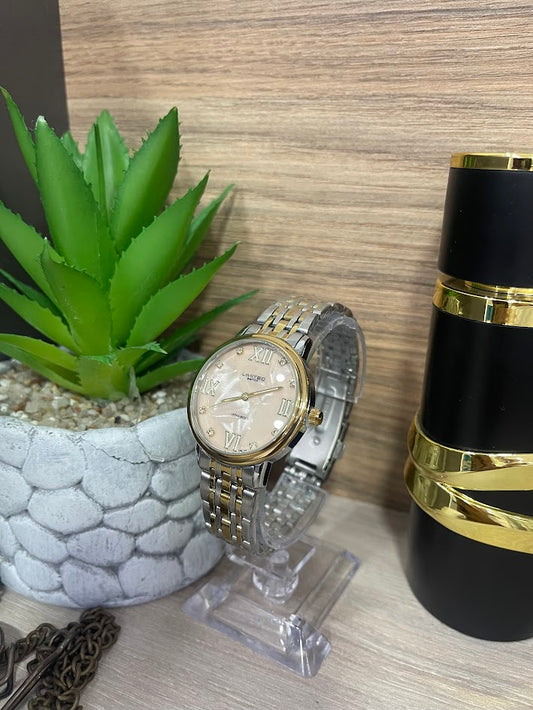 RELOJ LIMITED BICOLOR FONDO ROSADO