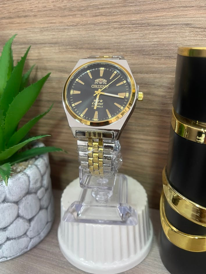 RELOJ ORIENT BICOLOR Y NEGRO