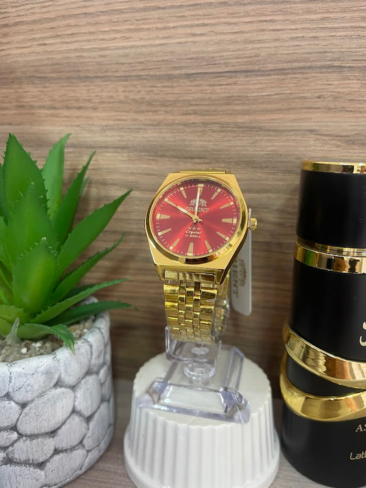 RELOJ ORIENT DORADO Y ROJO