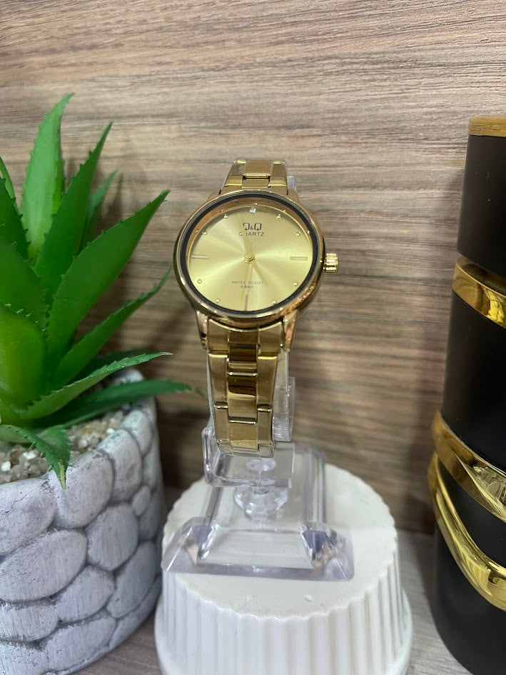 RELOJ QYQ DAMA DORADO REDONDO