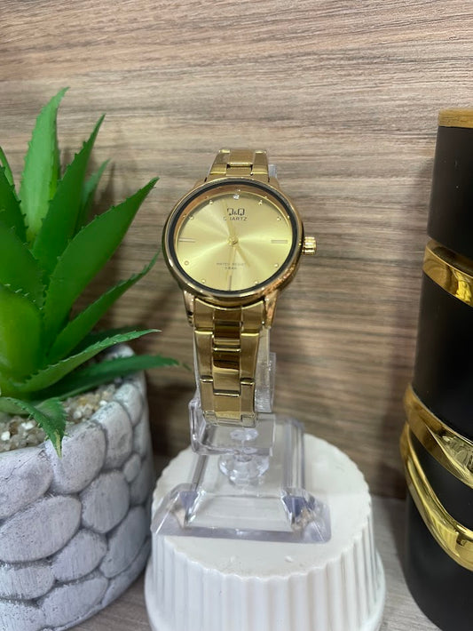 RELOJ QYQ DAMA DORADO REDONDO