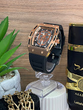 RELOJ RICHAR MILLER NEGRO Y ORO ROSA