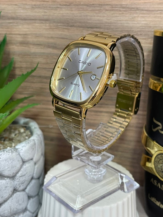 RELOJ CASIO DORADO TABLERO PLATEADO