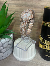 RELOJ GUESS REDONDO ORO ROSA