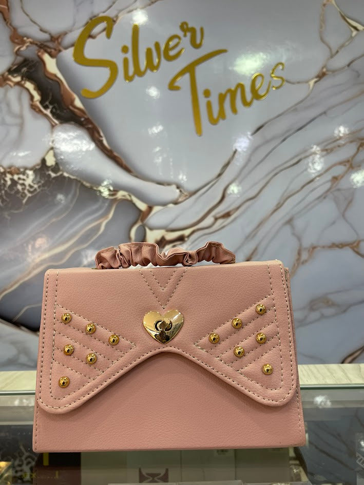 BOLSO DAMA ROSADO DETALLE CORAZON