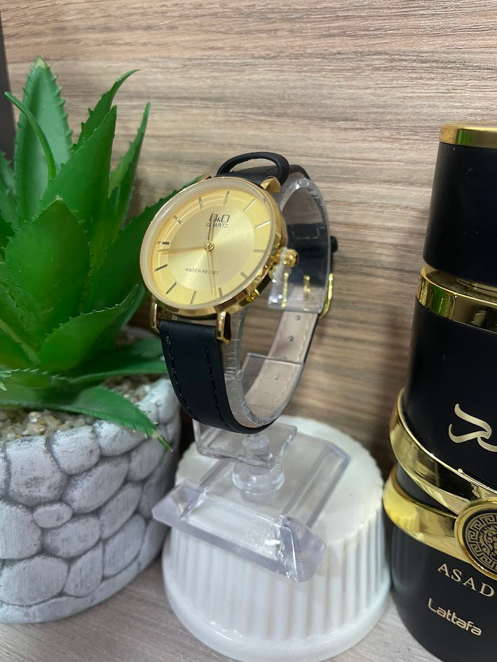 RELOJ QYQ DAMA REDONDO MANILLA DE CUERO