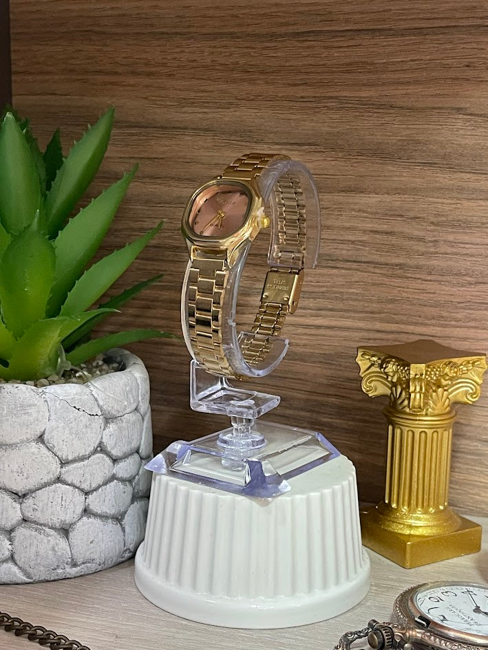 RELOJ OMSAN DORADO FONDO ROSADO