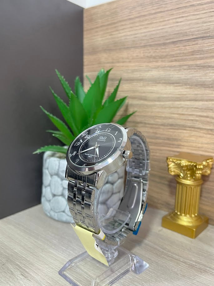 RELOJ QYQ CABALLERO BICOLOR NUMEROS COMPLETOS