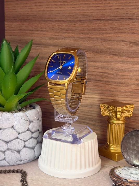 RELOJ CASIO DAMA DORADO TABLERO AZUL REY