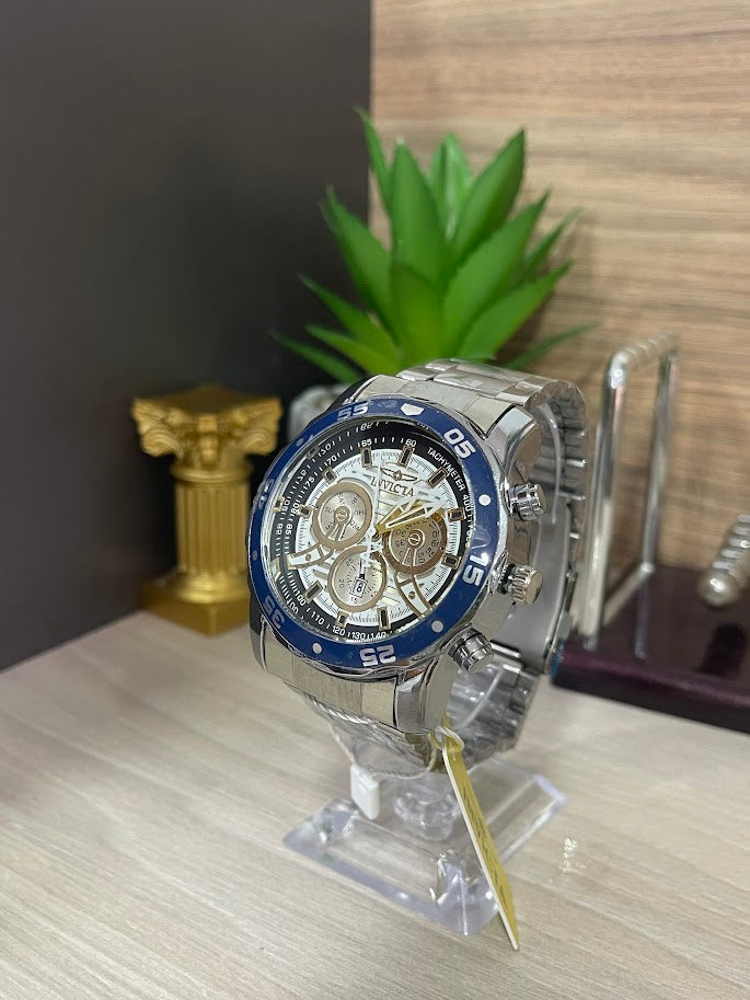 RELOJ INVICTA PLATEADO ARO AZUL CABALLERO