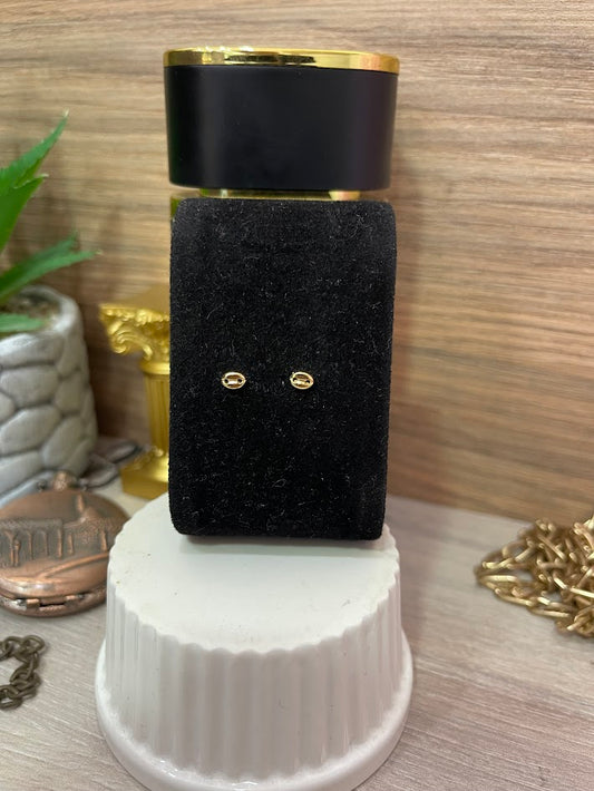 TOPO GUCCI MINI 5X3MM ORO LAMINADO