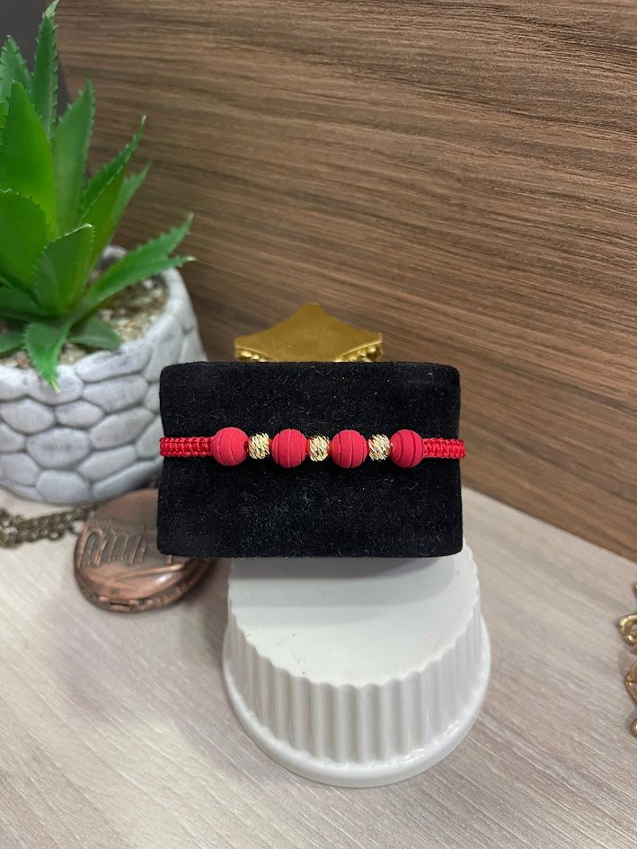 PULSERA TEJIDA NEOPRENO BALIN 6MM ROJA ORO LAMINADO
