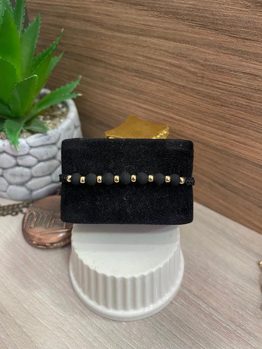 PULSERA TEJIDA NEGRA NEOPRENO BALIN 4MM ORO LAMINADO