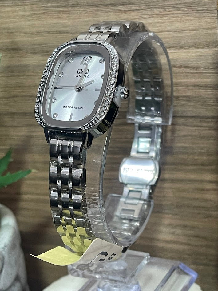 RELOJ QYQ DAMA PLATEADO CON BRILLANTES