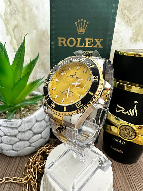 ROLEX BICOLOR ESFERA DORADA ARO NEGRO