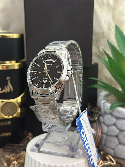 CASIO CABALLEROS PLATEADO FONDO NEGROS CALENDARIO