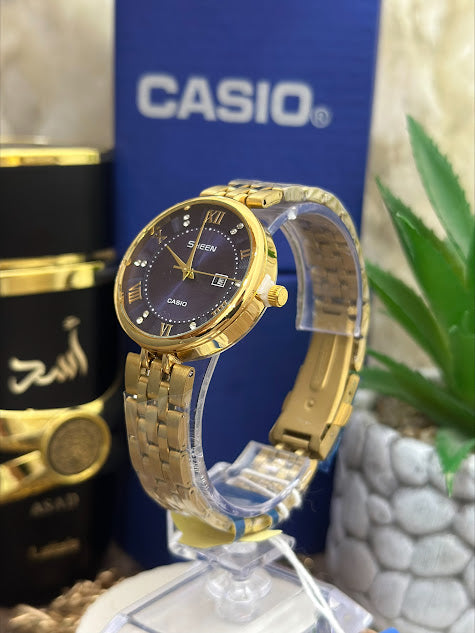 CASIO SHEEN DORADO ESFERA AZUL