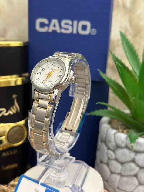 CASIO DAMA BICOLOR ESFERA BLANCA NUMEROS Y CALENDARIO