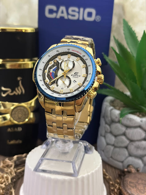 CASIO METALICO DORADO FONDO BLANCO ARO AZUL