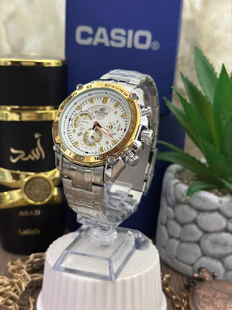 CASIO EDIFICE PLATEADO ARO DORADO FONDO BLANCO