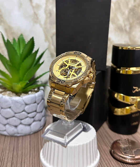 FOSSIL FONDO DORADO METALICO